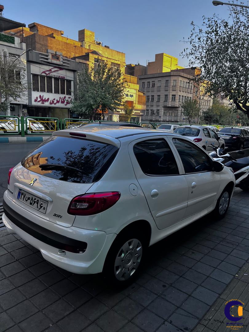 نمای 2 از خرید پژو 207i دنده‌ای مدل  2023-1402 مدل 2023-1402 رنگ سفید نقدی و اقساطی در خودروشاپ