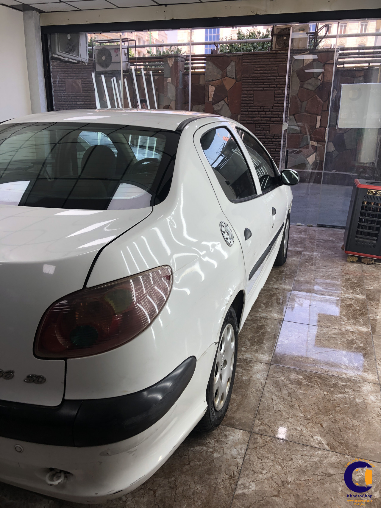 نمای 4 از خرید پژو 206 SD V8 مدل 2012-1391 مدل 2012-1391 رنگ سفید نقدی و اقساطی در خودروشاپ